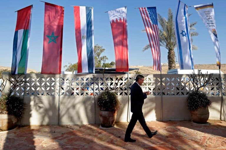 Flags are set up during Israel's Negev Summit attended by the US Secretary of State, alongside Foreign Ministers of Israel, Egypt, Bahrain, the UAE, and Morocco, at Sde Boker in the southern Negev desert on March 28, 2022.