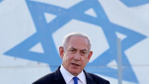 Israel's Prime Minister Benjamin Netanyahu delivers a speech during his visit to an Israeli unmanned aerial vehicle center, at the Palmachim Airbase near the city of Rishon LeZion on July 5, 2023. (Photo by Jack Guez/AFP via Getty Images)