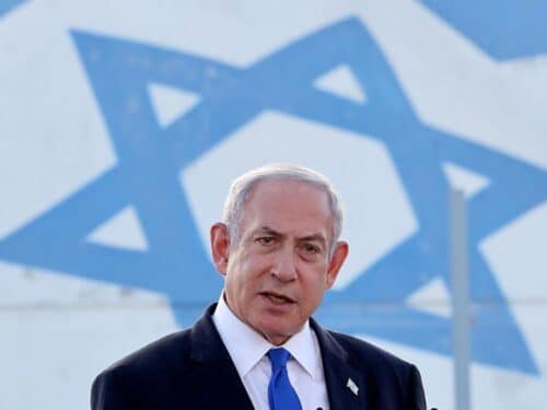 Israel's Prime Minister Benjamin Netanyahu delivers a speech during his visit to an Israeli unmanned aerial vehicle center, at the Palmachim Airbase near the city of Rishon LeZion on July 5, 2023. (Photo by Jack Guez/AFP via Getty Images)