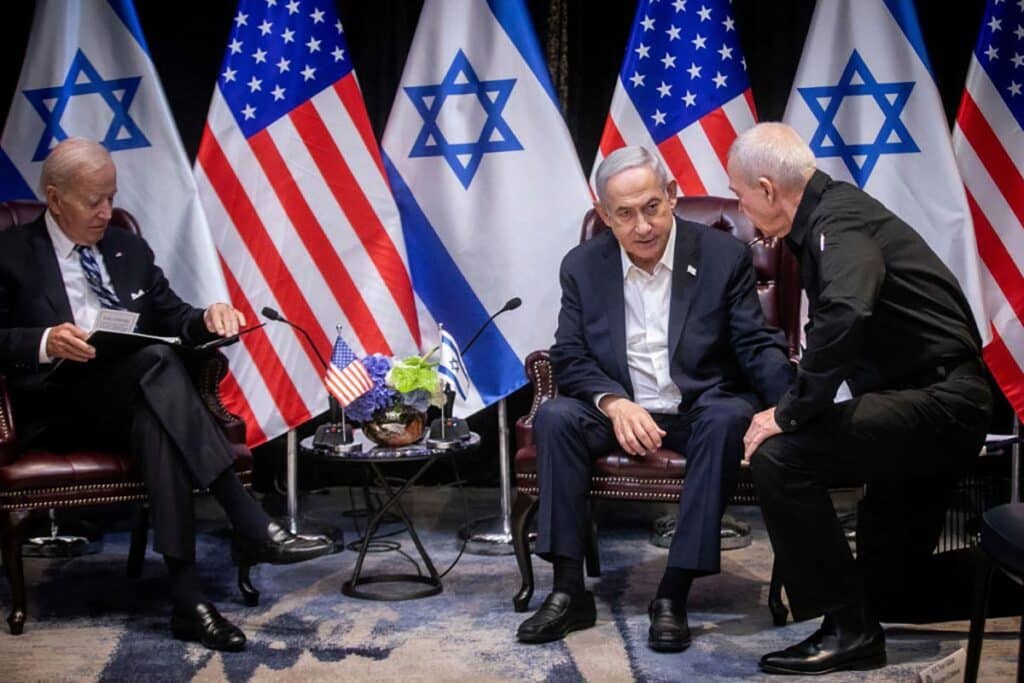 Israeli Prime Minister Benjamin Netanyahu (2nR), confers with Defense Minister Yoav Gallant (R), during their meeting with US President Joe Biden (L) at the start of the Israeli war cabinet meeting, in Tel Aviv on October 18, 2023