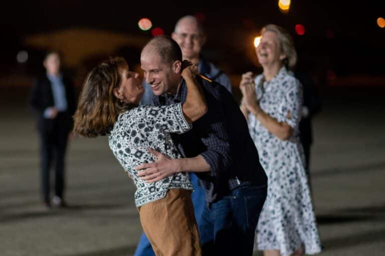 Wall Street Journal reporter Evan Gershkovich embraces his mother, Ella Milman, after being welcomed back to the U.S.