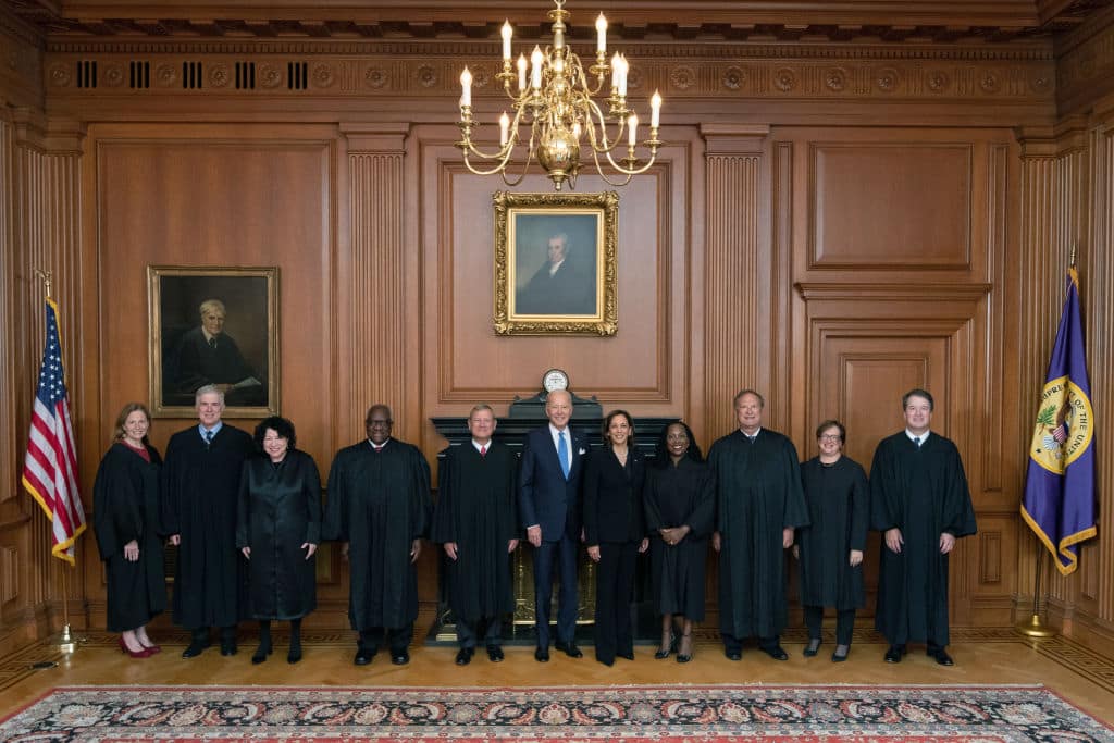 WASHINGTON, DC - SEPTEMBER 30: (EDITORIAL USE ONLY)  In this handout provided by the Collection of the Supreme Court of the United States, Members of the Supreme Court with the President (L-R)  Associate Justices Amy Coney Barrett, Neil M. Gorsuch, Sonia Sotomayor, and Clarence Thomas, Chief Justice John G. Roberts, Jr., President Joseph R. Biden, Jr., Vice President Kamala Harris, and Associate Justices Ketanji Brown Jackson, Samuel A. Alito, Jr., Elena Kagan, and Brett M. Kavanaugh pose at a courtesy visit in the Justices Conference Room prior to the investiture ceremony of Associate Justice Ketanji Brown Jackson September 30, 2022 in Washington, DC. President Joseph R. Biden, Jr., First Lady Dr. Jill Biden, Vice President Kamala Harris, and Second Gentleman Douglas Emhoff attended as guests of the Court. On June 30, 2022, Justice Jackson took the oaths of office to become the 104th Associate Justice of the Supreme Court of the United States. (Photo by Collection of the Supreme Court of the United States via Getty Images)