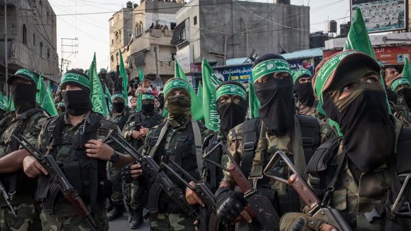 Hamas members are seen during a military show in the Bani Suheila district on July 20, 2017 in Gaza City. (Photo by Chris McGrath/Getty Images)