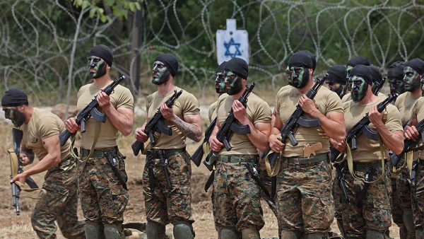 Lebanese Hezbollah fighters take part in cross-border raids, part of large-scale military exercise, in Aaramta bordering Israel on May 21, 2023 ahead of the anniversary of Israel's withdrawal from southern Lebanon in 2000. (Photo by ANWAR AMRO/AFP via Getty Images)