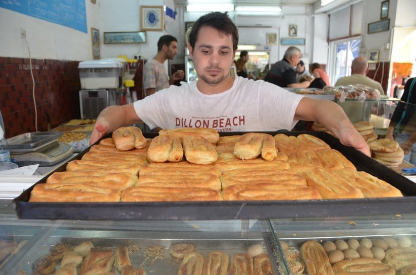 Yocahi Panso is a fourth-generation boureka baker. His family's store at Levinsky Market specializes in the savory Turkish pastry./Erez Kaganovitz